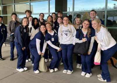 Morgantown High School juniors gather outside J.W. Ruby Memorial Hospital on their first day of hands-on experience, marking an important milestone in their healthcare career exploration.